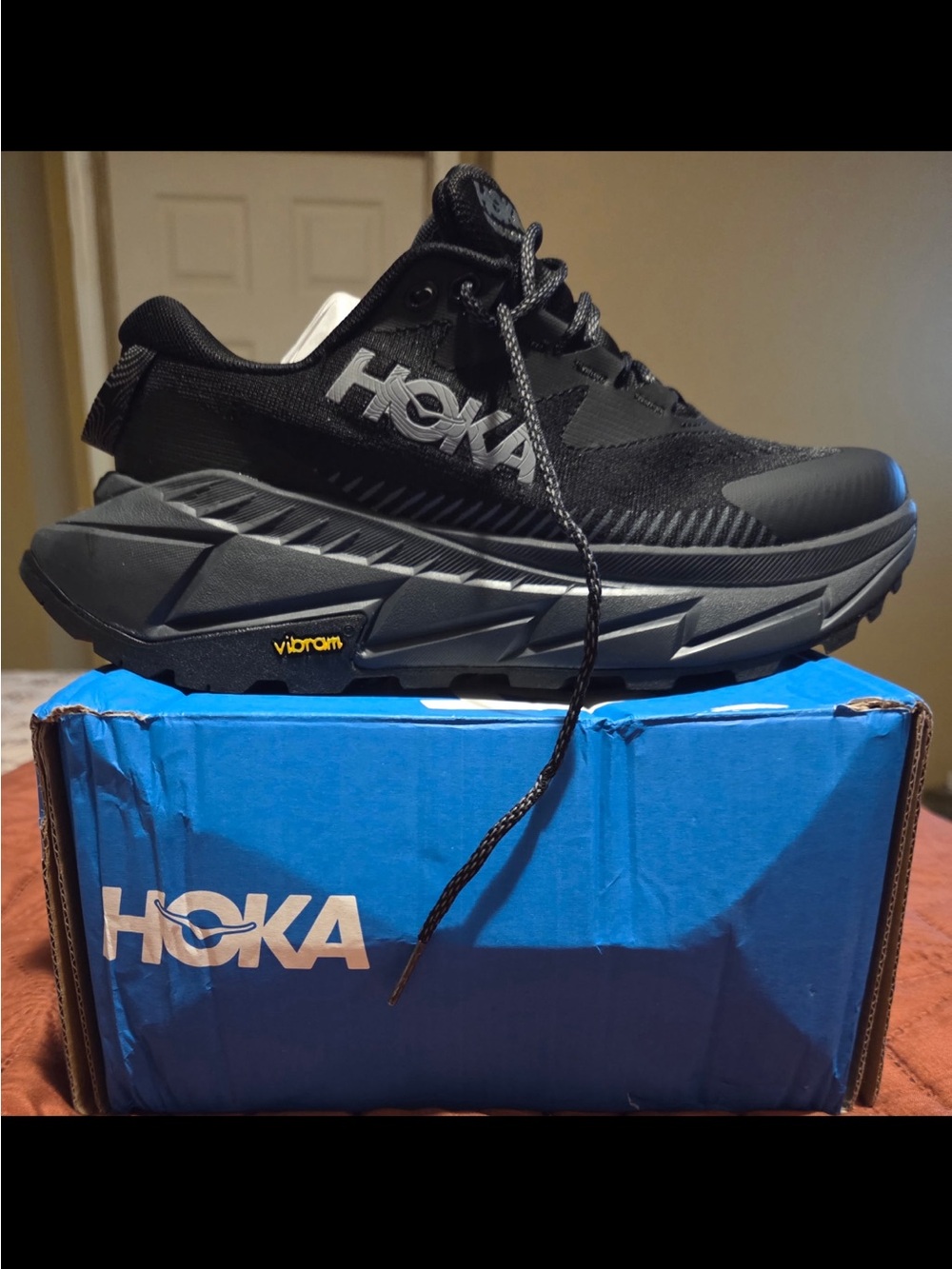Hoka Men's Black Athletic Trail Shoe with Yellow Vibram Accent